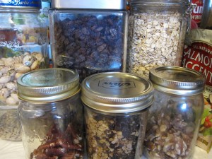 Raisins, pecans, oats, walnuts in a healthy pantry